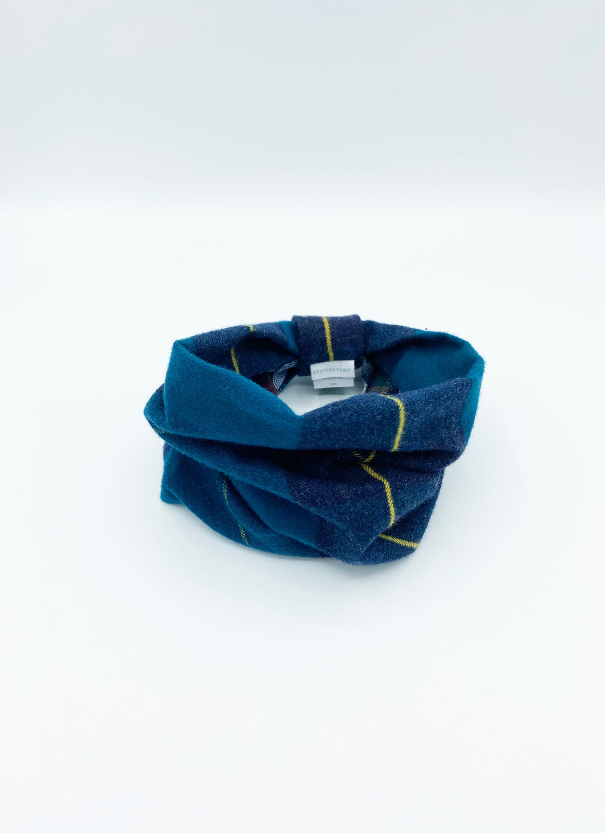 Blue plaid headband on a white background