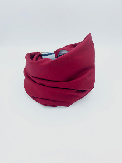 Red fabric roll on a white background