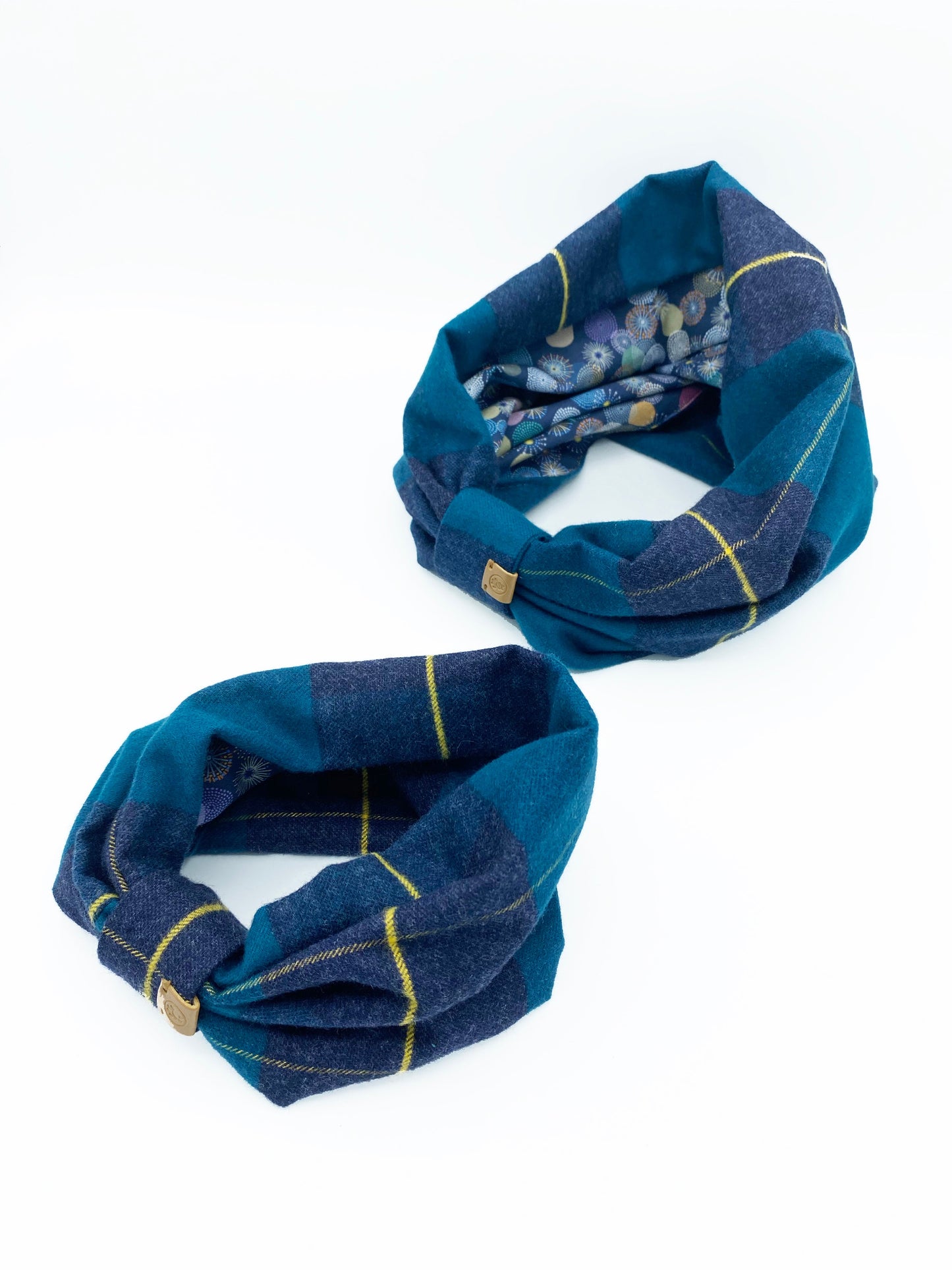 Blue plaid scarf on a white background