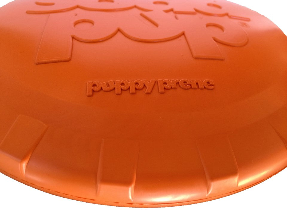 Orange dog toy with 'Puppy Pride' branding on a white background