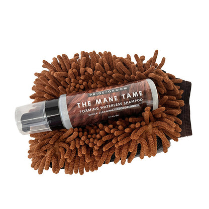 Foaming waterless shampoo with a microfiber applicator on a white background