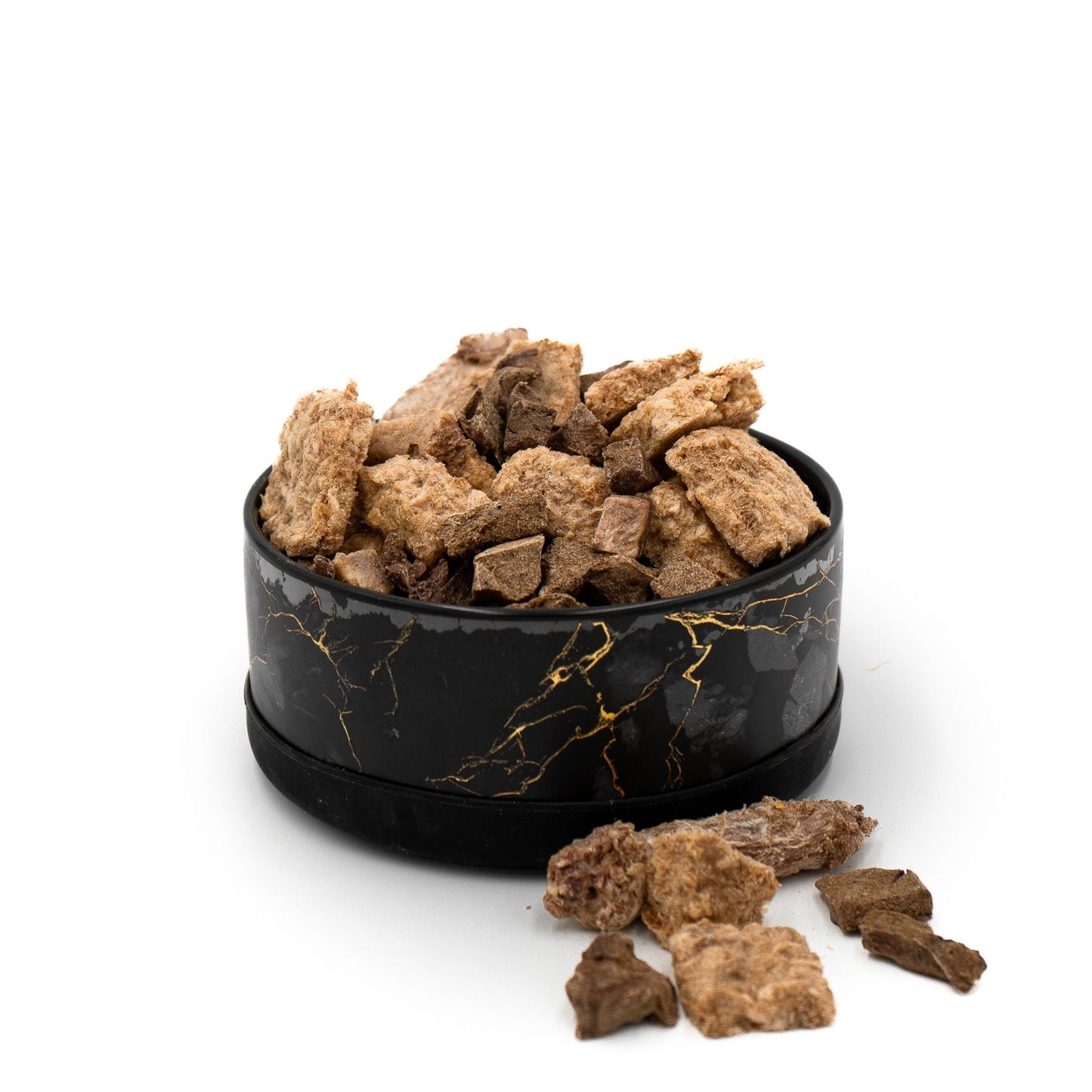 Black marble-patterned container filled with brown dog treats on a white background