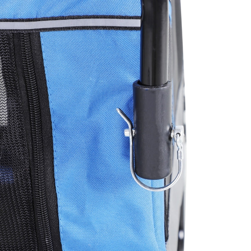 Close-up of a blue bag with a black handle and metal hook on a white background