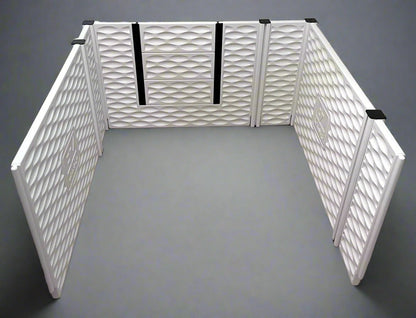 White pet playpen with black straps on a gray background