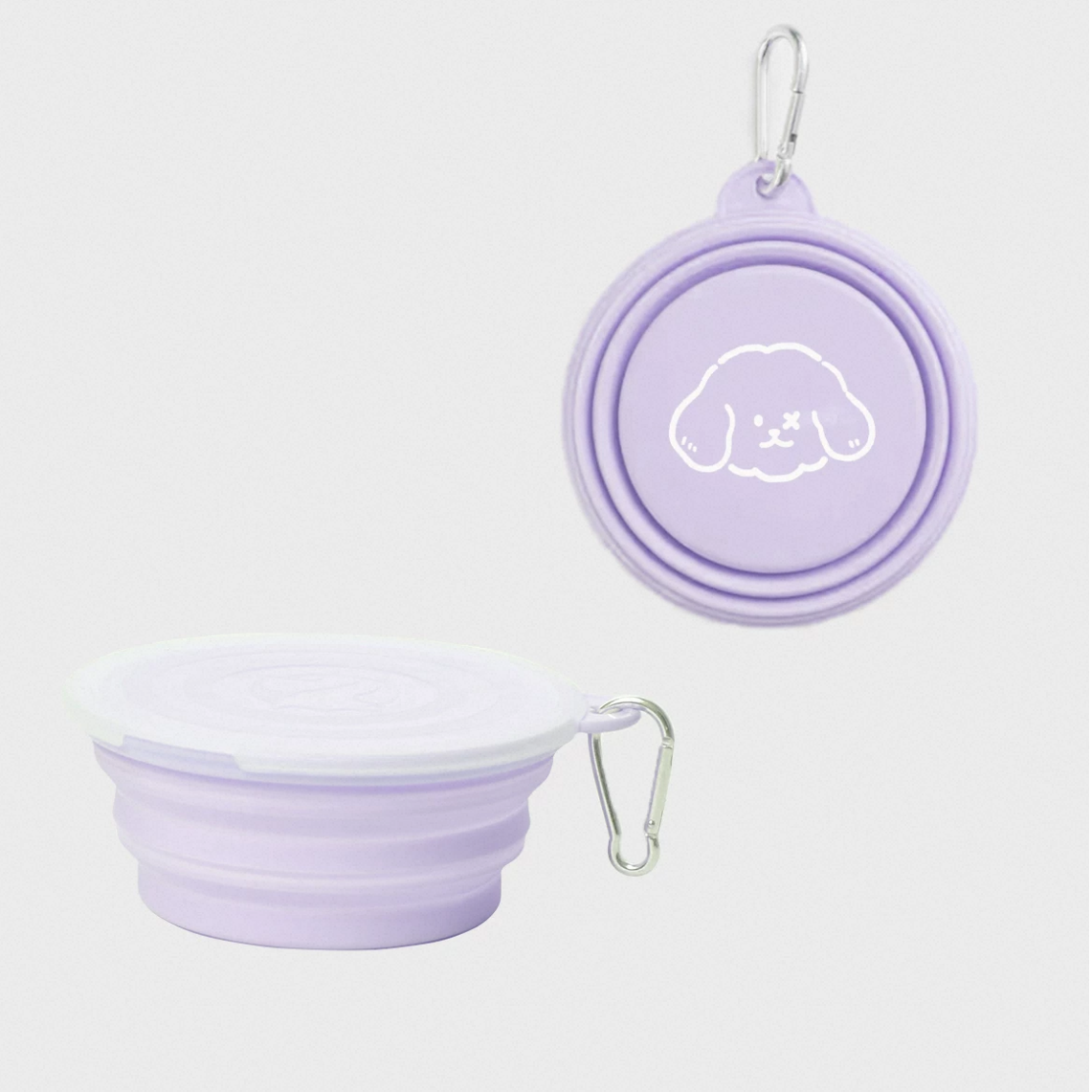 Collapsible purple silicone travel bowl with lid and carabiner on a white background