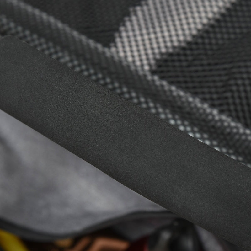 Close-up of textured black fabric with a subtle pattern