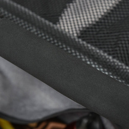 Close-up of textured black fabric with a subtle pattern