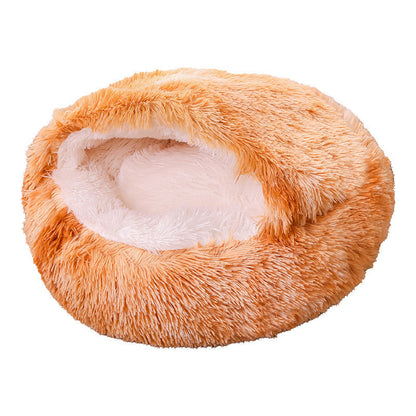 Fluffy orange pet bed on a white background