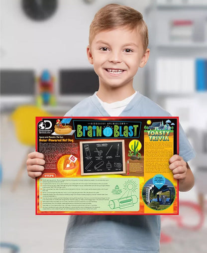 Child holding a colorful educational poster with various activities and trivia questions.