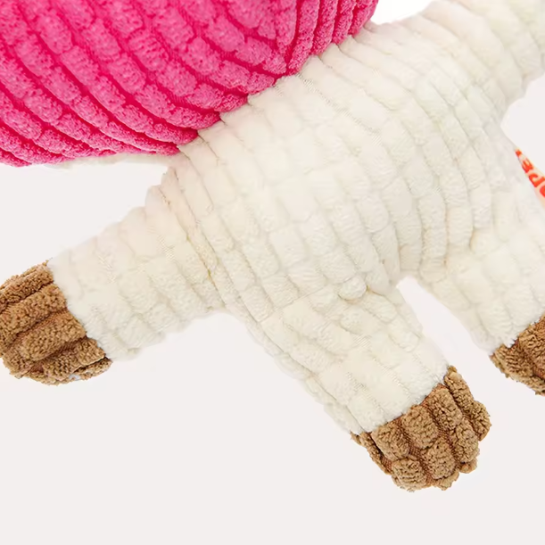 Close-up of a pink and beige textured product on a white background