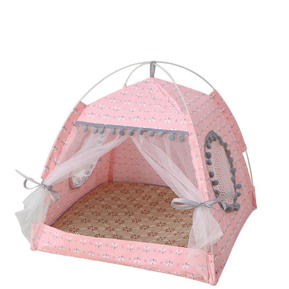Pink pet tent with canopy and bedding on a white background