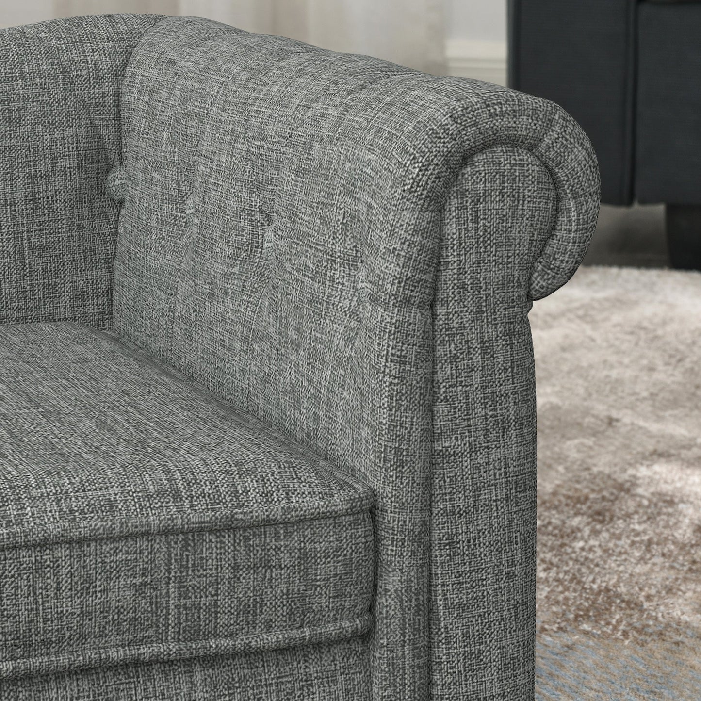 Gray textured armchair with a blurred background