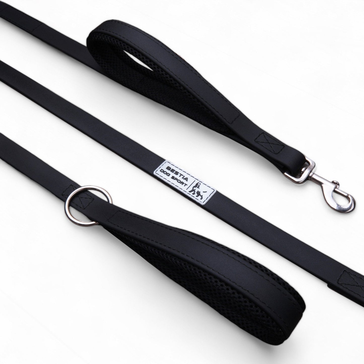 Black dog leash with a metal clip on a white background