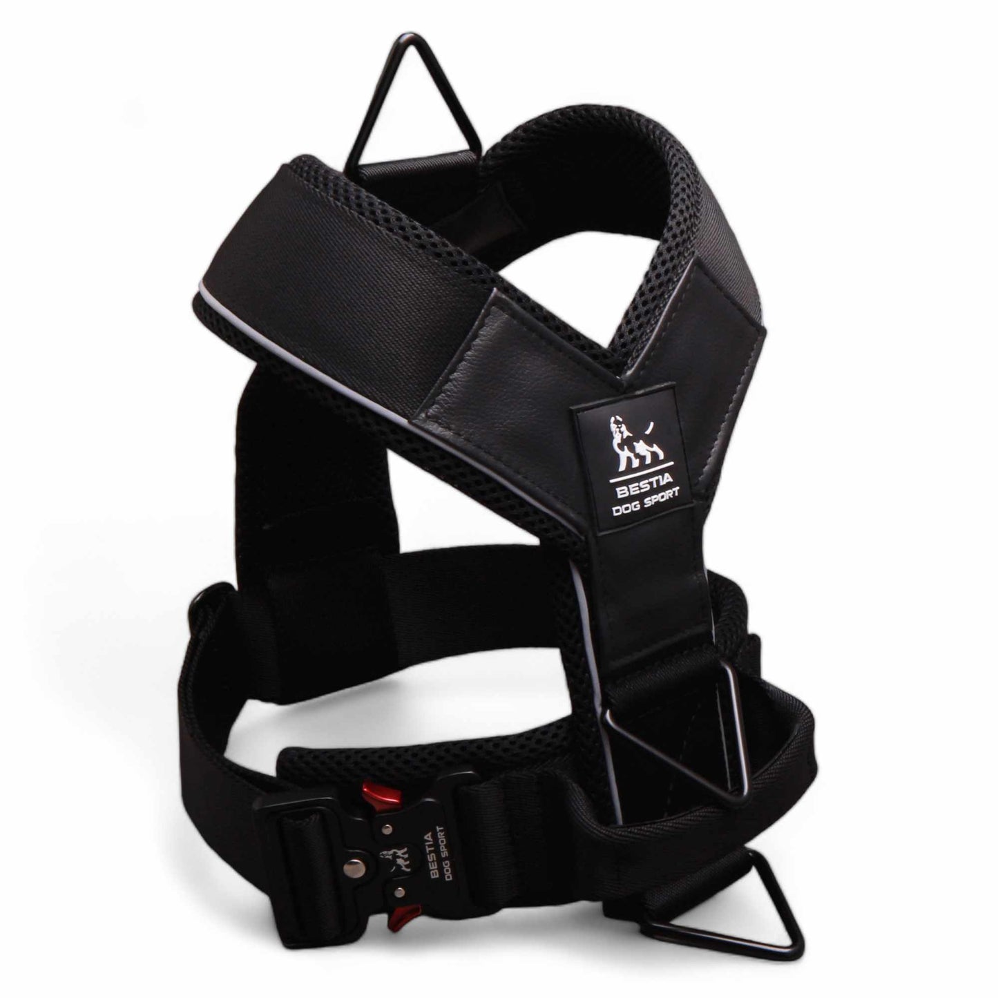 Black dog harness with visible brand logo on a white background
