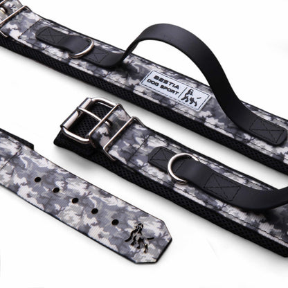 Two dog collars with a camouflage pattern on a white background