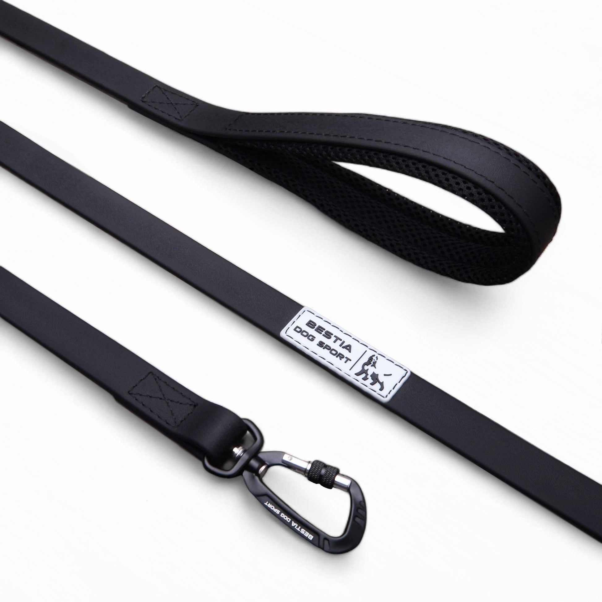Black dog leash with a brand label on a white background