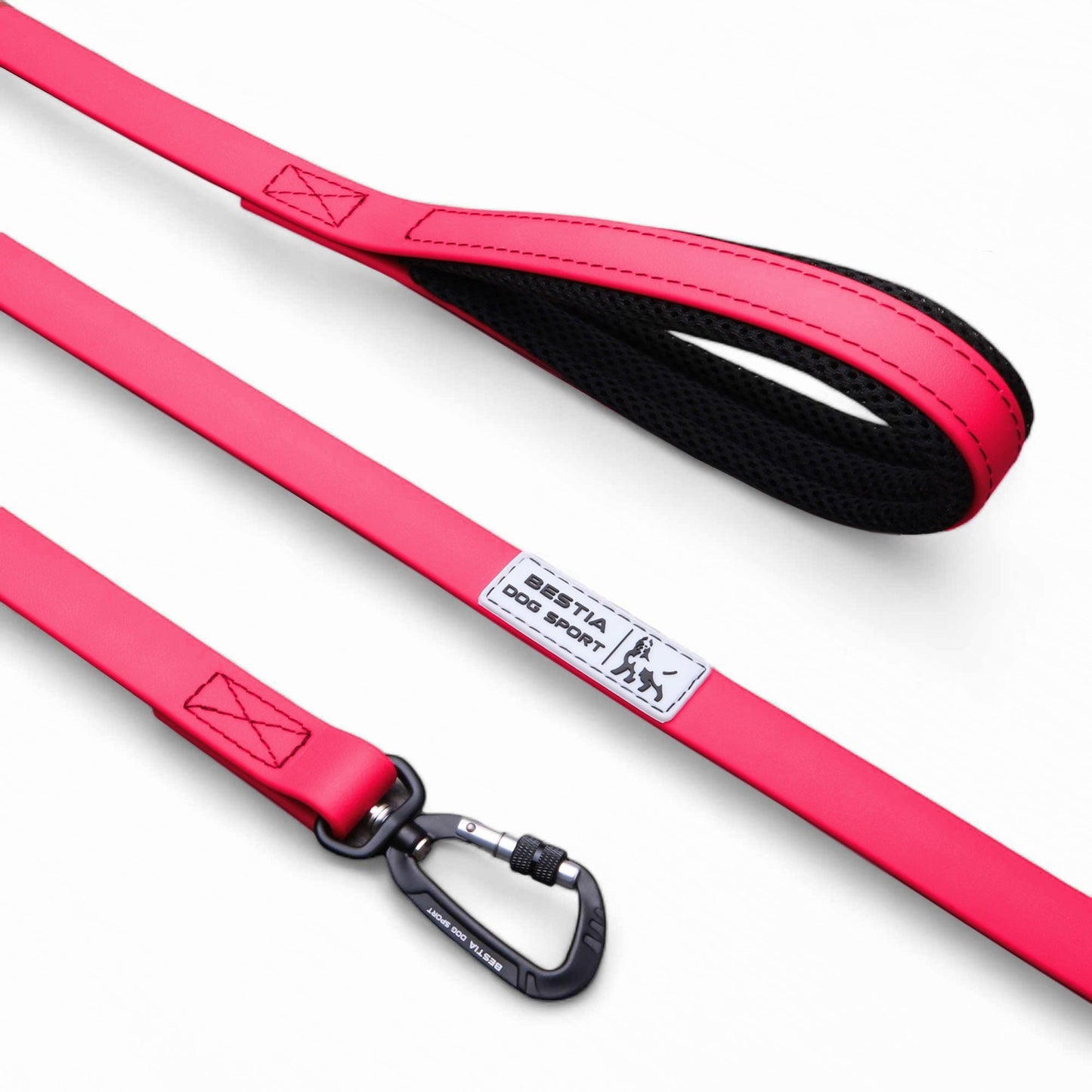 Red dog leash with black clip on a white background