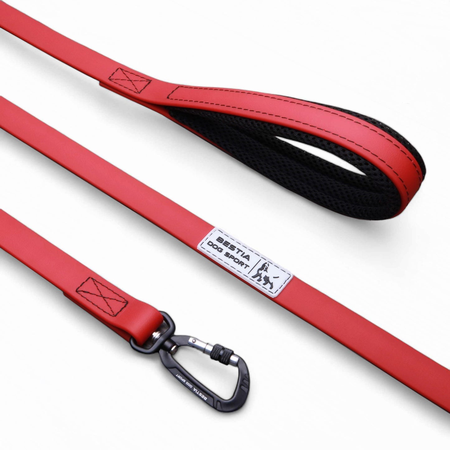 Red dog leash with black carabiner on a white background