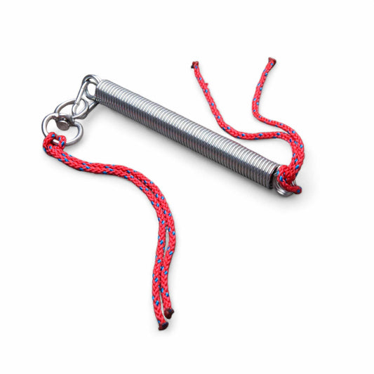Metal spring with red and blue braided rope on a white background