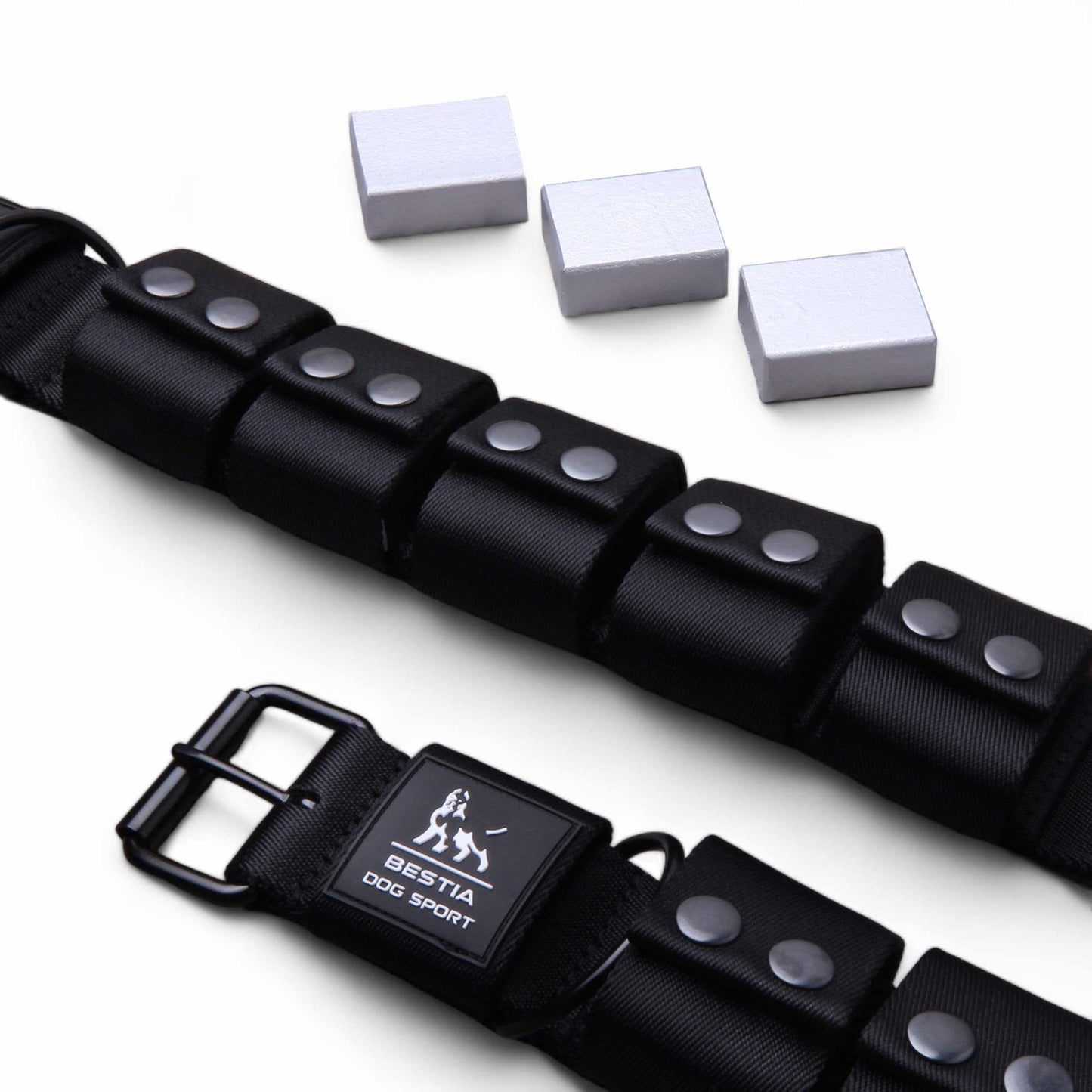 Black dog collar with metal studs and a visible brand logo on a white background