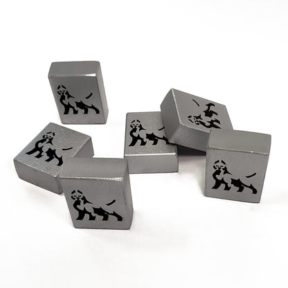 Silver dice cubes with lion engravings on a white background