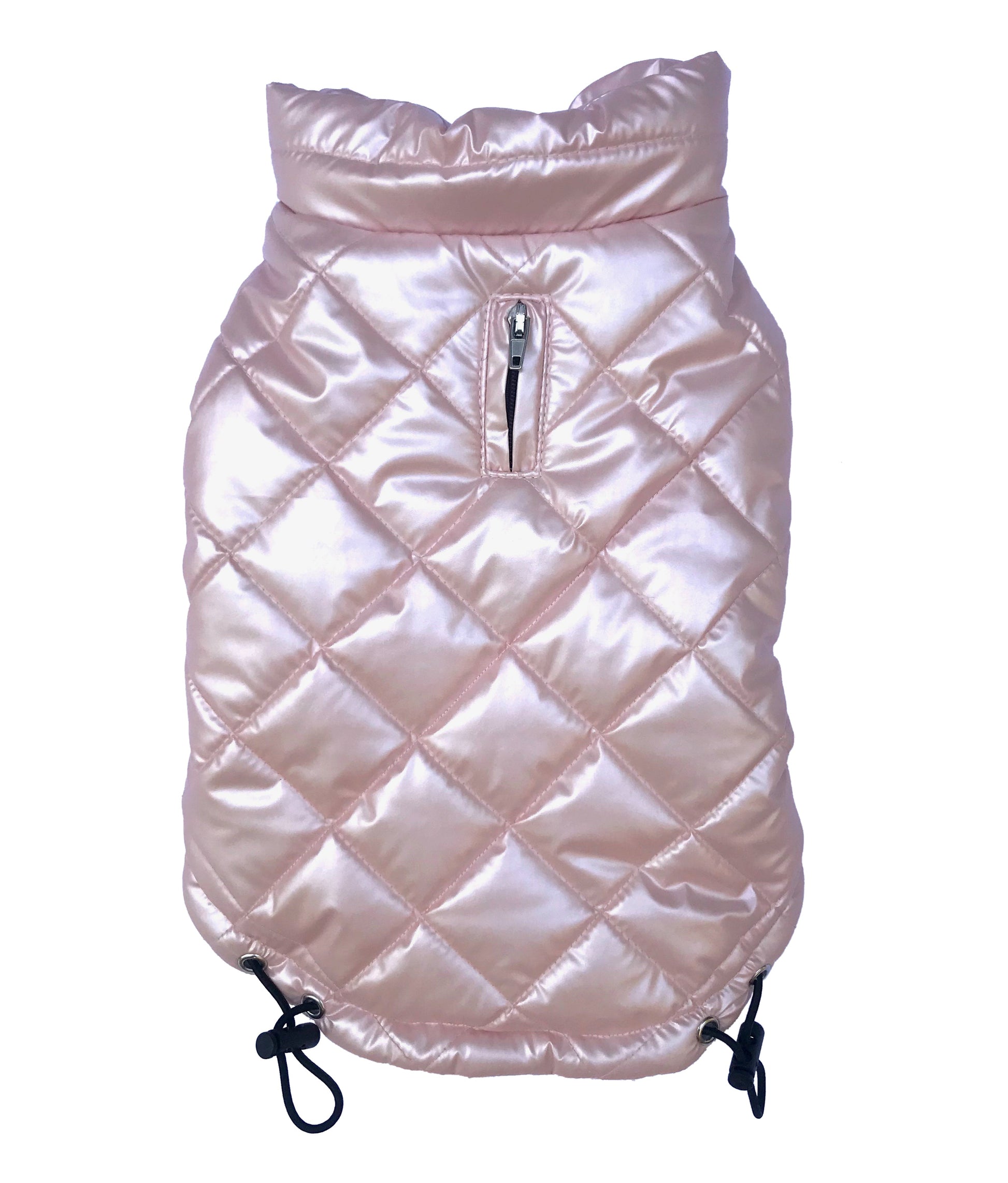 Pink quilted dog vest on a white background
