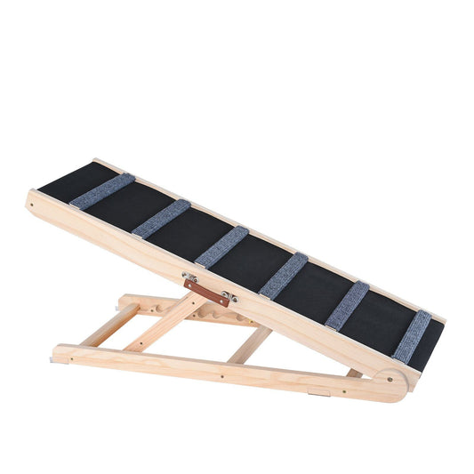 Wooden pet ramp with black mat and blue straps on a white background