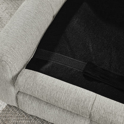 Gray upholstered chair with a black cushioned seat
