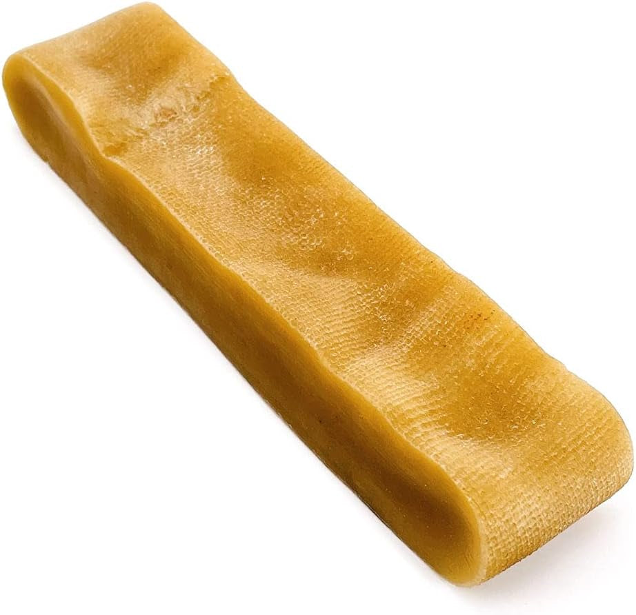 Rectangular piece of yellowish-brown material on a white background