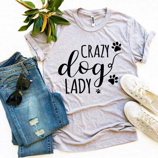 Gray t-shirt with 'Crazy Dog Lady' text, paired with jeans and sneakers on a white background.