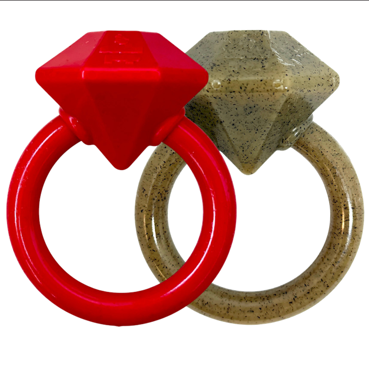 Two diamond-shaped objects, one red and one beige, on a white background