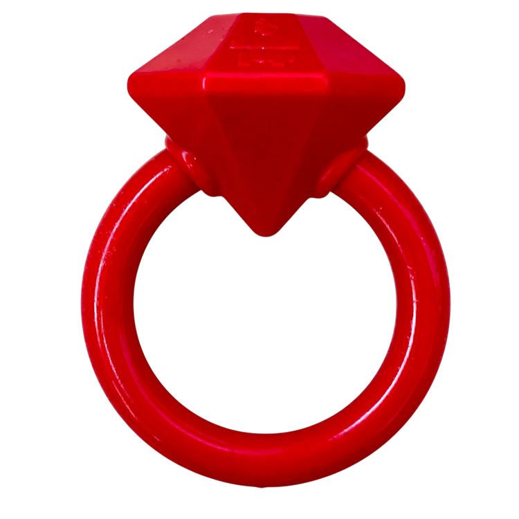 Red plastic ring with a square handle on a white background