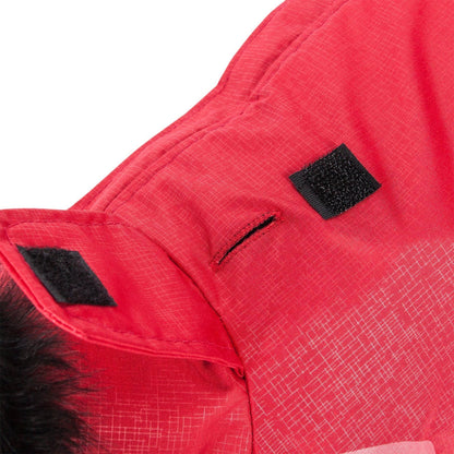 Close-up of a red jacket with a black patch on a white background