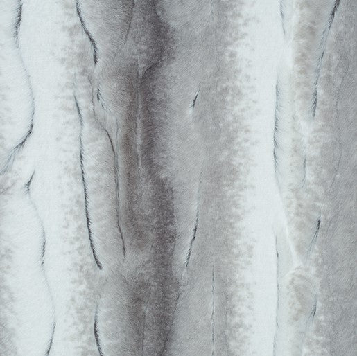 Close-up of textured white fabric with folds
