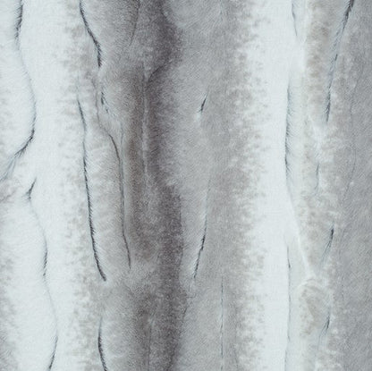 Close-up of textured white fabric with folds