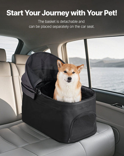 Pet carrier in a car with a dog inside, set against a scenic background.