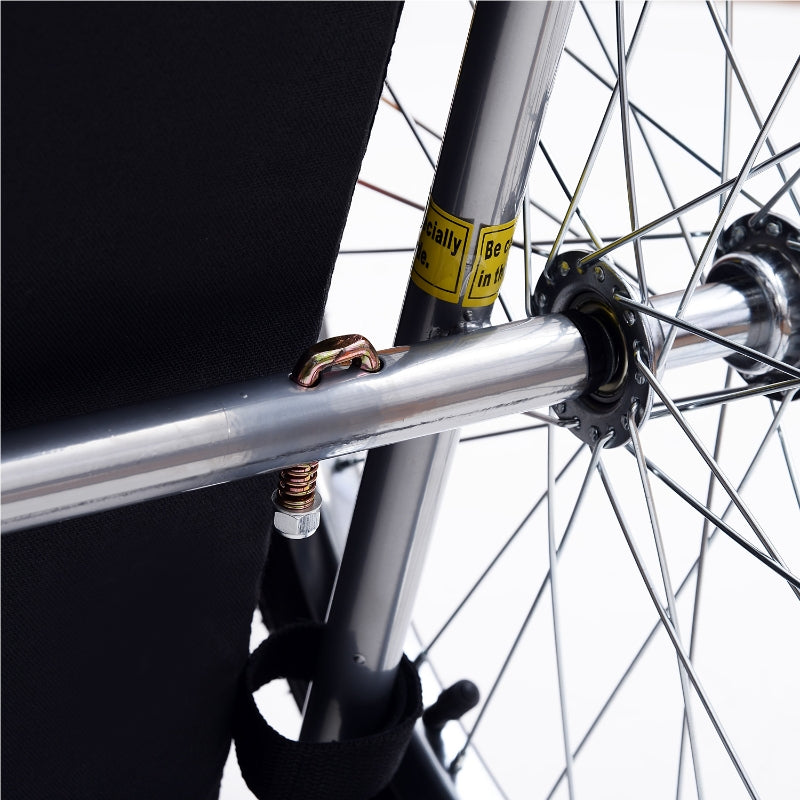 Close-up of a bicycle wheel with a black background