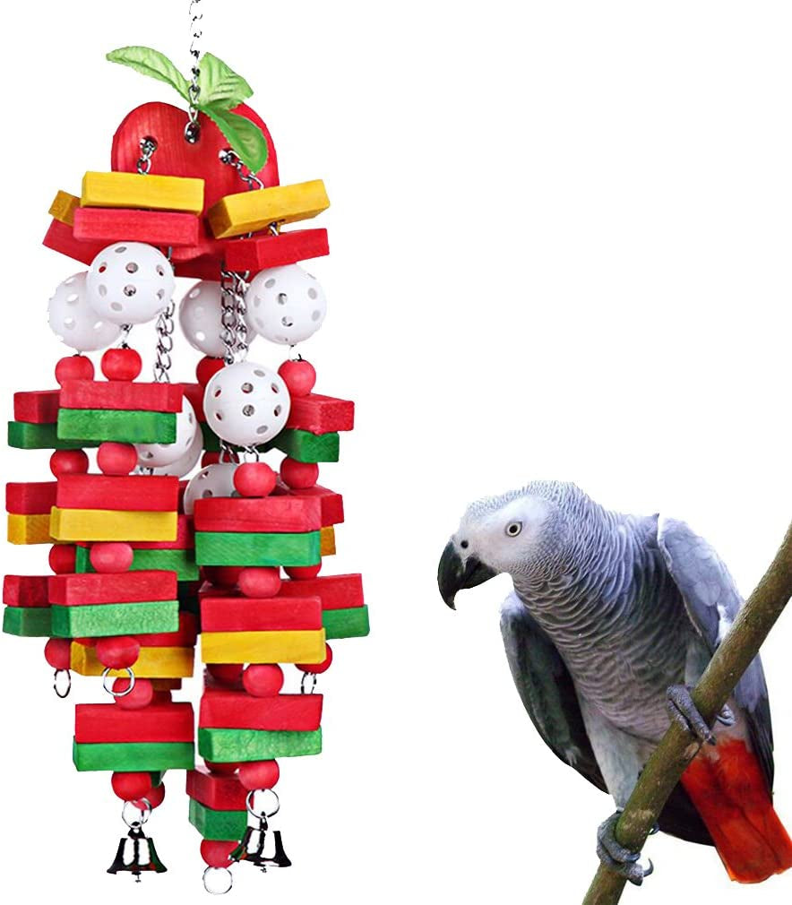 Colorful bird toy with a gray parrot perched on it against a white background