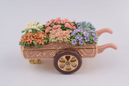 Decorative toy cart with colorful flowers on a white background