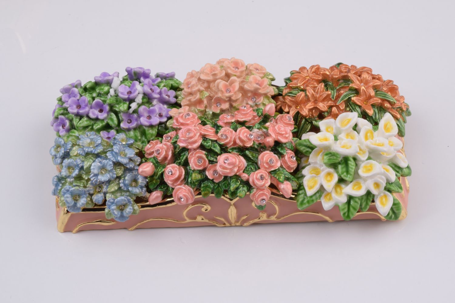 Decorative box with colorful floral designs on a white background