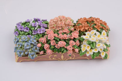Decorative box with colorful floral designs on a white background