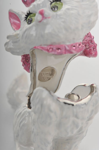 Cat-shaped shoe with decorative pink bow and 'Betsey Johnson' branding on a white background