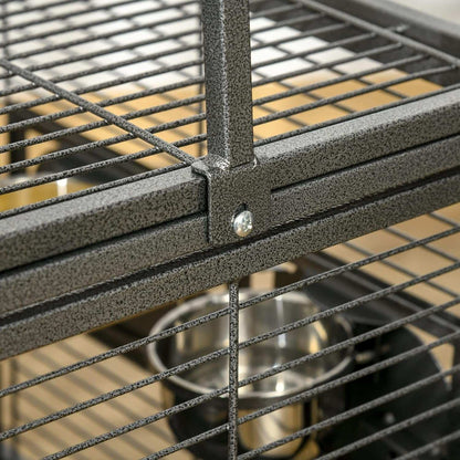 Close-up of a metal cage with a focus on the corner and wire details.