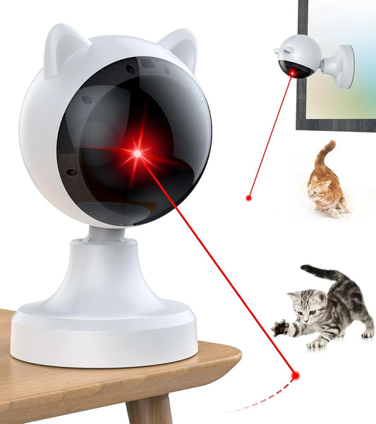White cat-shaped laser toy with red laser pointer on a wooden surface, showing two cats being attracted by the laser.