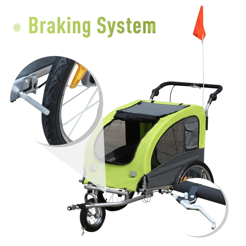 Green and gray bicycle trailer with a close-up of its braking system on a white background.