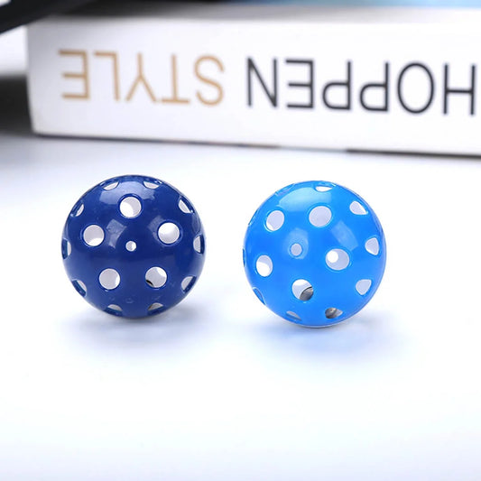 Blue Polka Dot Balls on a white background with "Hoppen Style" in the background.