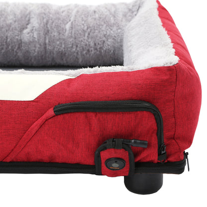 Red pet bed with gray cushion on a white background
