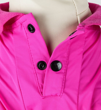 Close-up of a bright pink jacket with black buttons on a mannequin.
