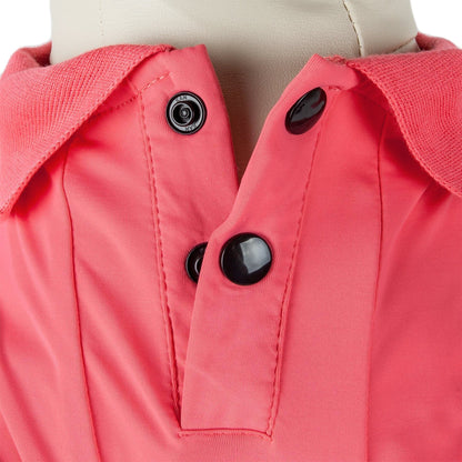 Close-up of a pink jacket with black buttons on a mannequin.