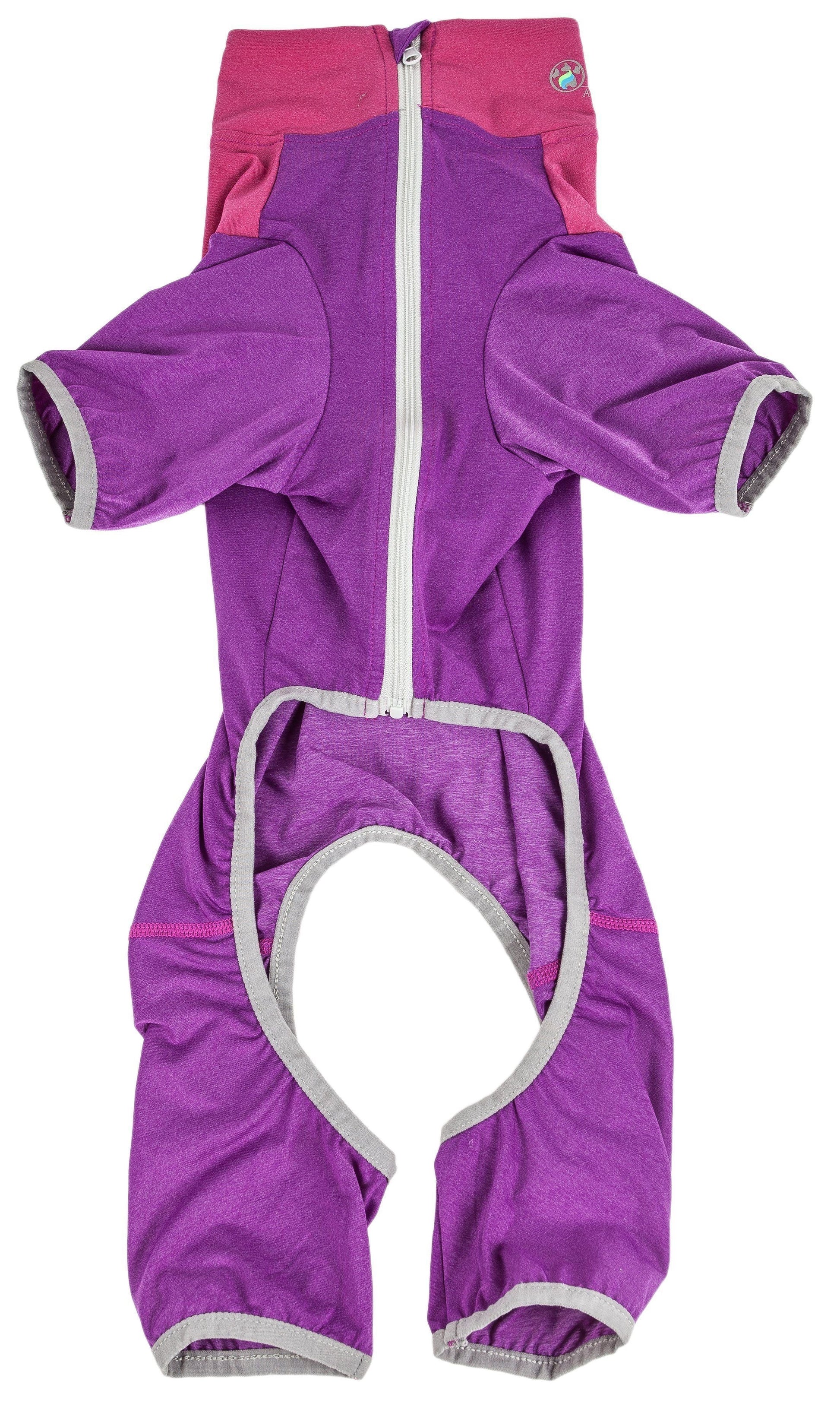 Purple children's snowsuit with pink hood on a white background
